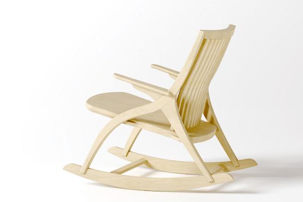 A DIY flat-pack white rocking chair.
